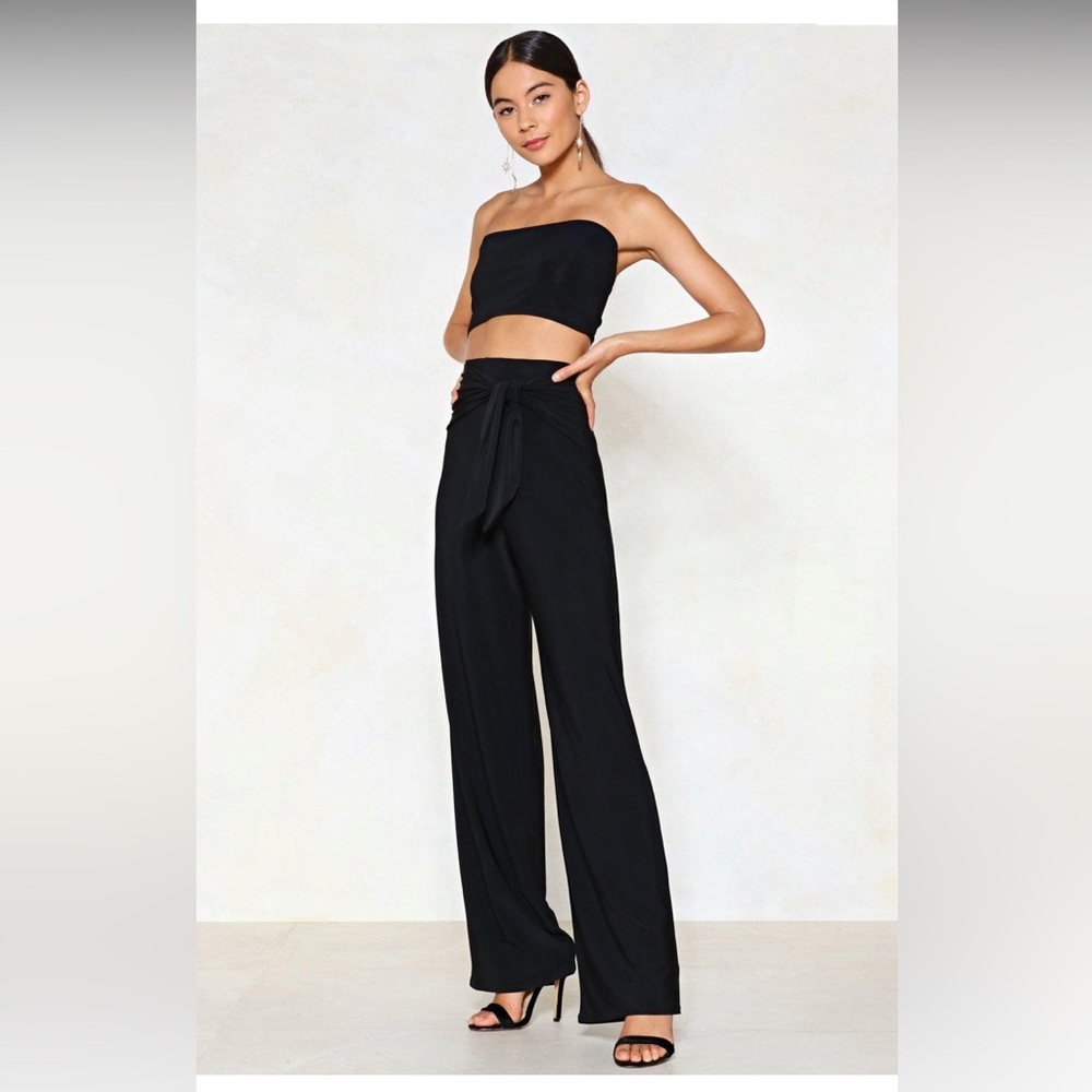 Nasty Gal “Tie Me Later Bandeau Top and Wide Leg Pants Set” in black.